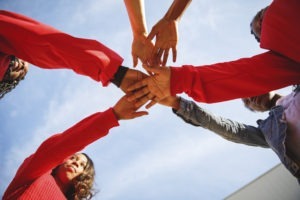 volunteers hands in