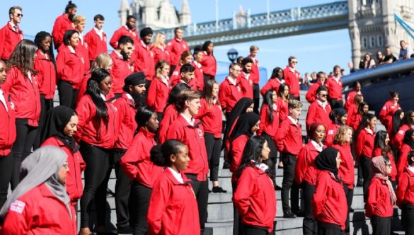 Volunteer mentors at Opening Day with the Tower Bridge in the background