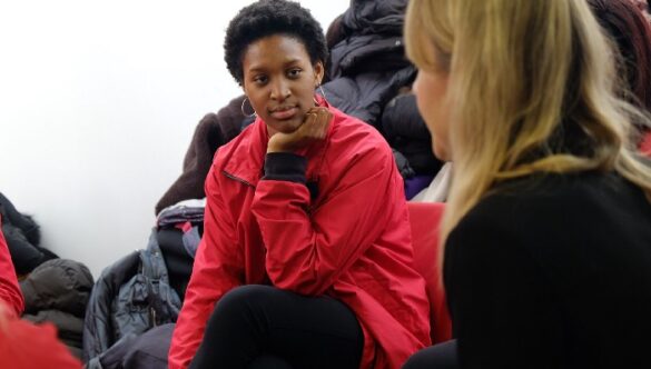 Two volunteer mentors talking