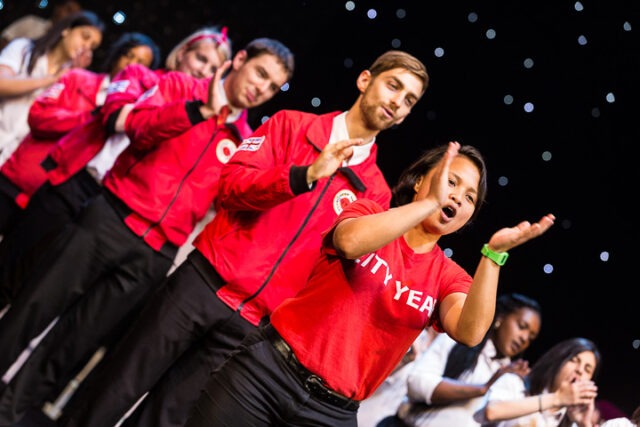 Volunteer mentors cheering