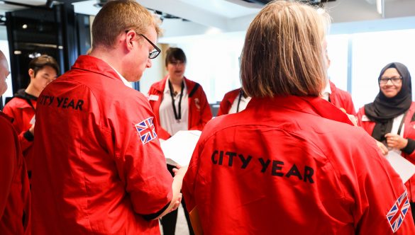 backs of red jackets